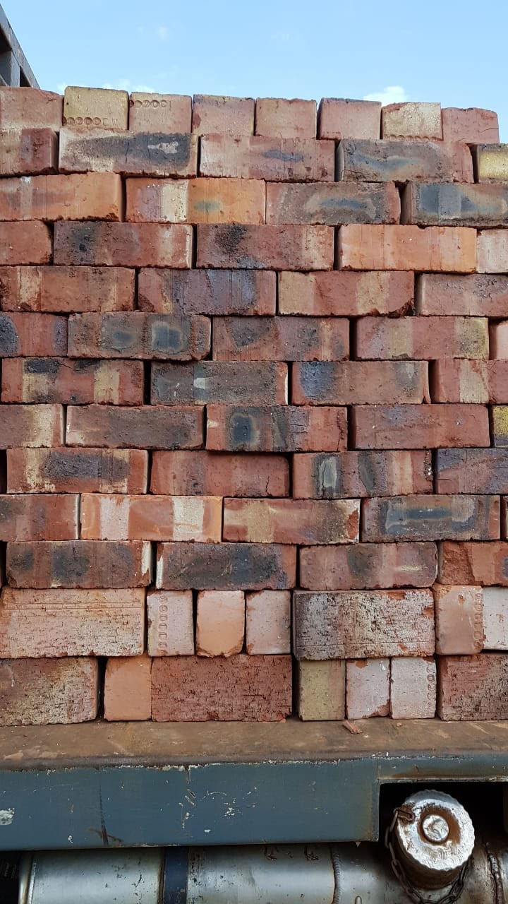 NFX clay stock bricks stacked on a truck